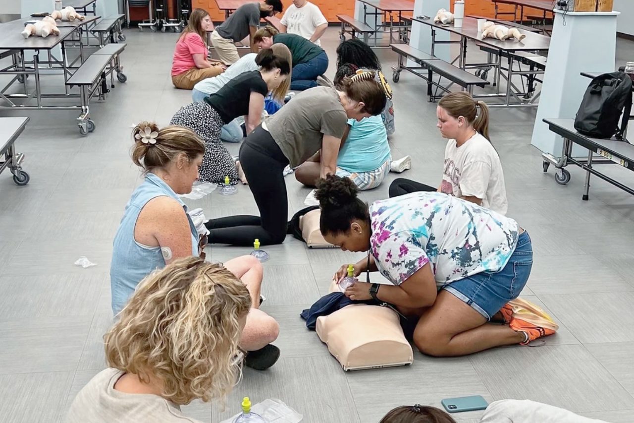 Chicago CPR Academy on-site at Catherine Cook School in Chicago. Staff learned how to perform CPR and AED skills